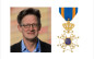 Afbeelding van Peter Schoenmakers decorated as Knight in the Order of the Lion of the Netherlands